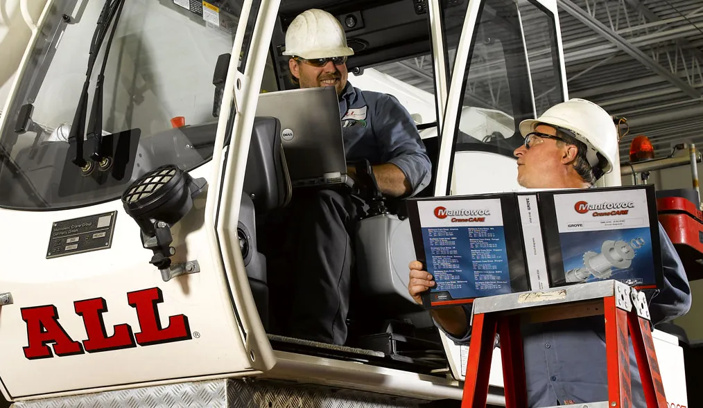 Two men working with guides