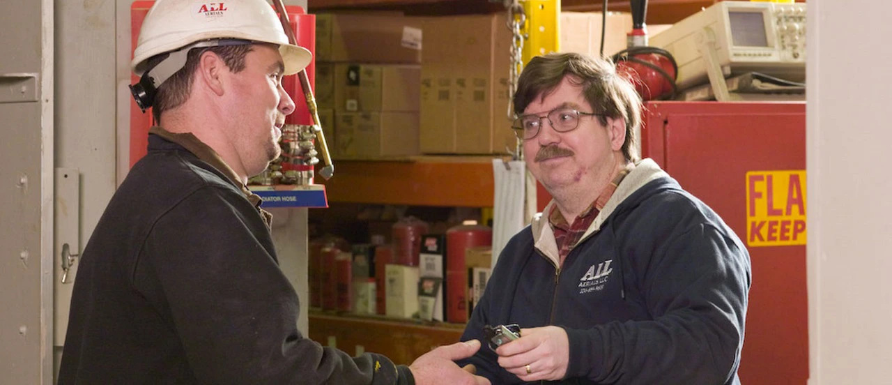 two men at equipment shop