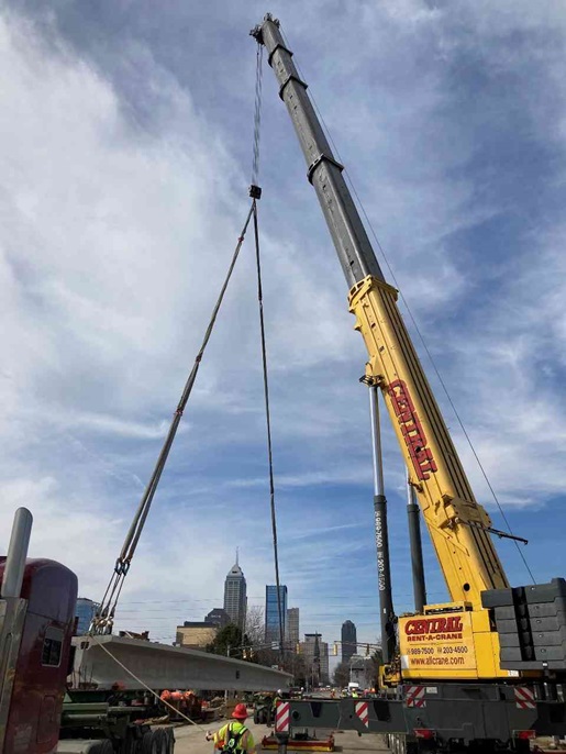Central Crane Rental and Sales lifts a beam