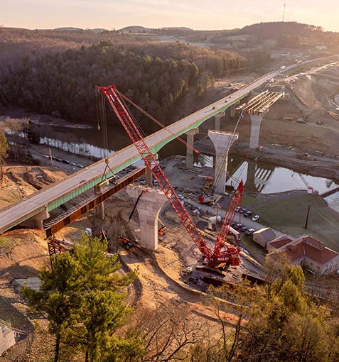 Crawler crane working on a bridge