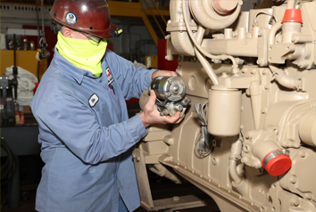 employee working on engine