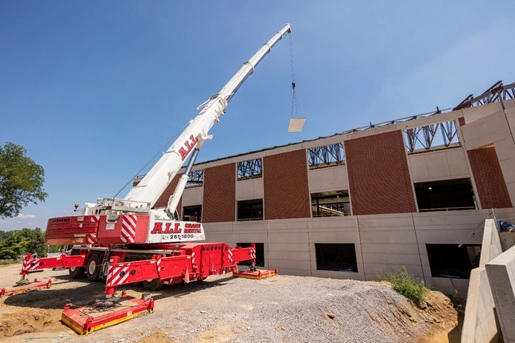 crane lifting trailer