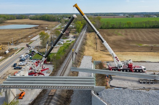 Cranes constructing a new vehicle overpass