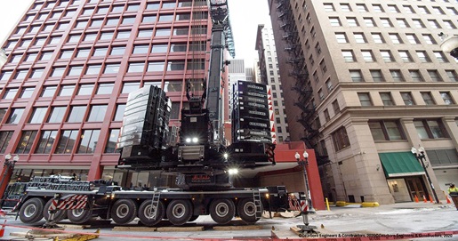 550-USt Liebherr LTM 1450-8.1 all-terrain crane by 44-story office building