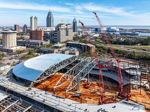 Two Manitowoc 999 crawlers working on the new Mobile Arena