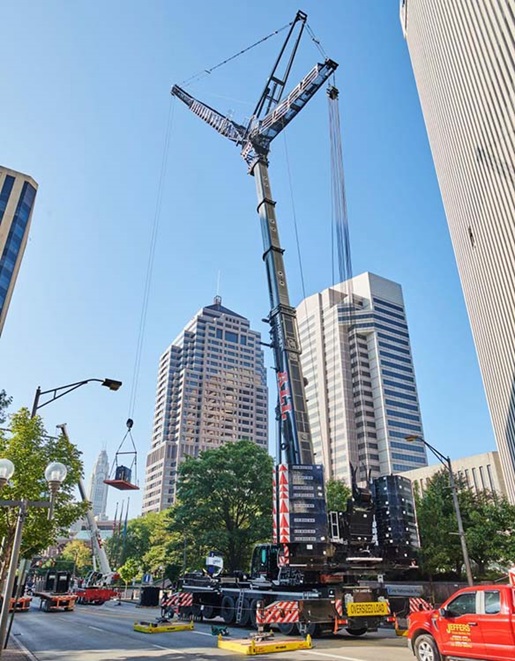 ALL Liebherr all-terrain crane on a downtown street
