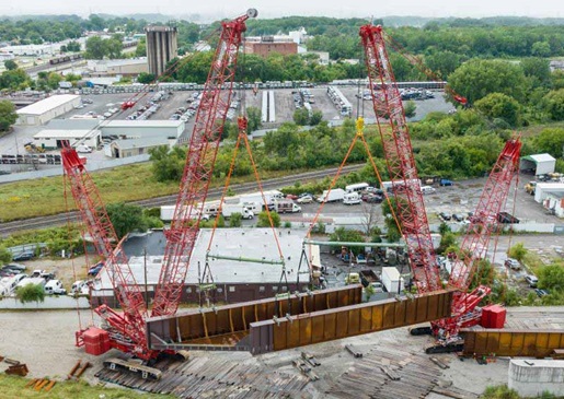 RAIL MATES Case Study Image 1 two red crawler cranes on a jobsite