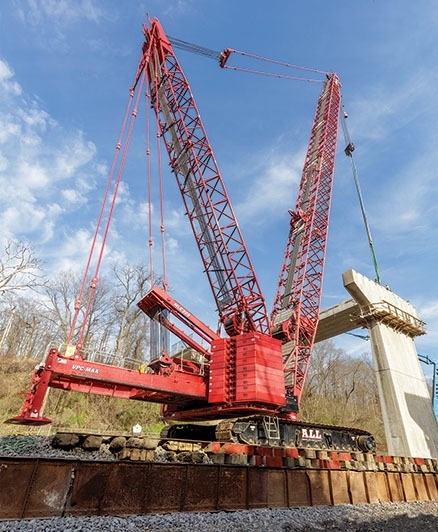 Crawler crane working on bridge