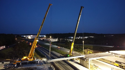 Two all-terrain cranes dual picking for a bridge over Indiana I-74