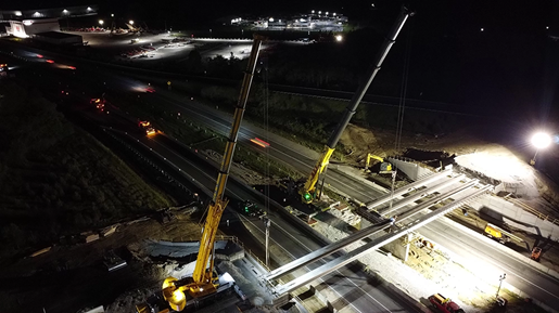 Two all-terrain cranes dual picking for a bridge over Indiana I-74
