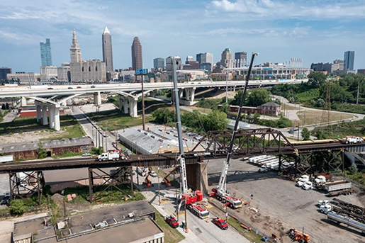 Two Liebherr LTM 1750-9.1's working on a railroad bridge