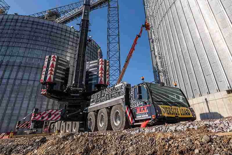 Crane outside of two buildings