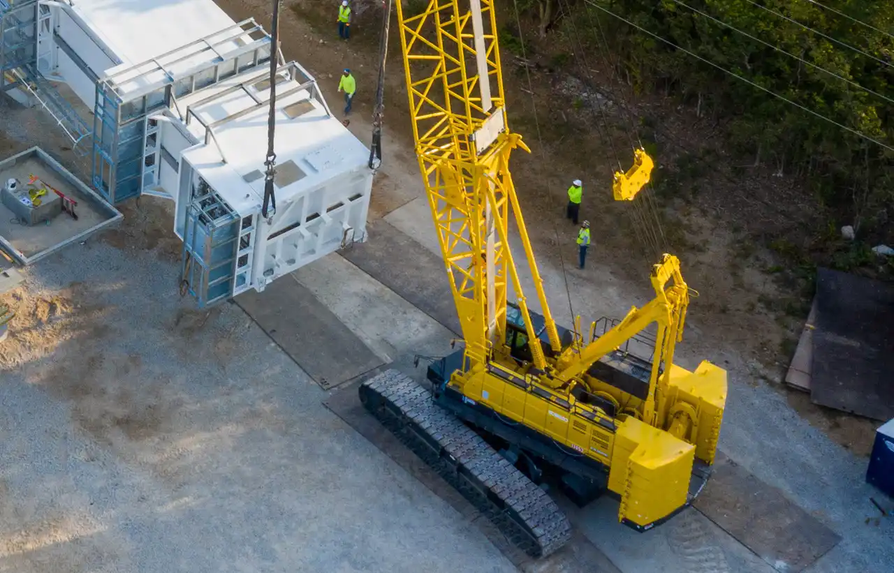 A crane bought from ALL being used on a job site.